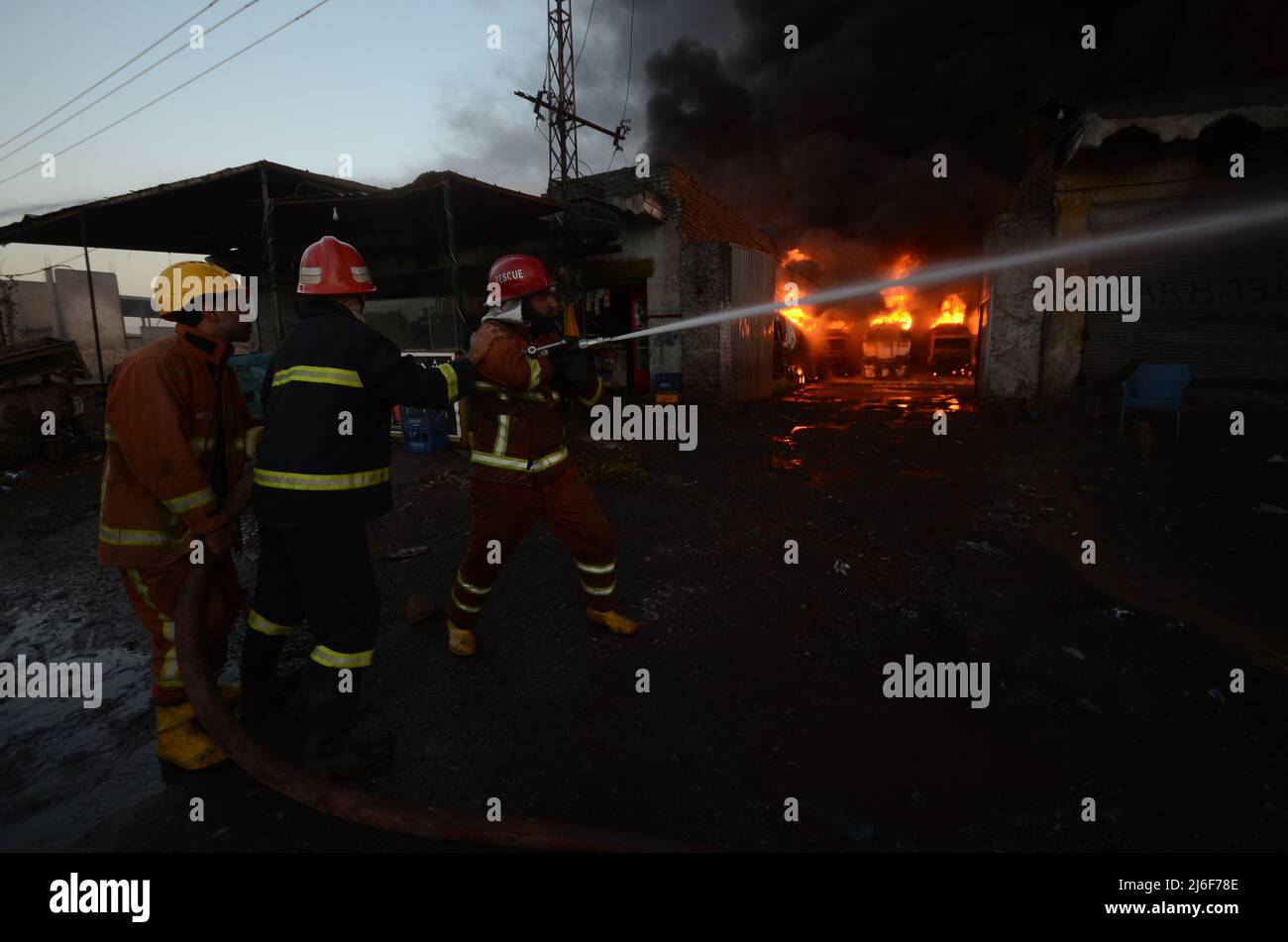 Firefighters try to extinguish the fire broke out at an oil tanker ...
