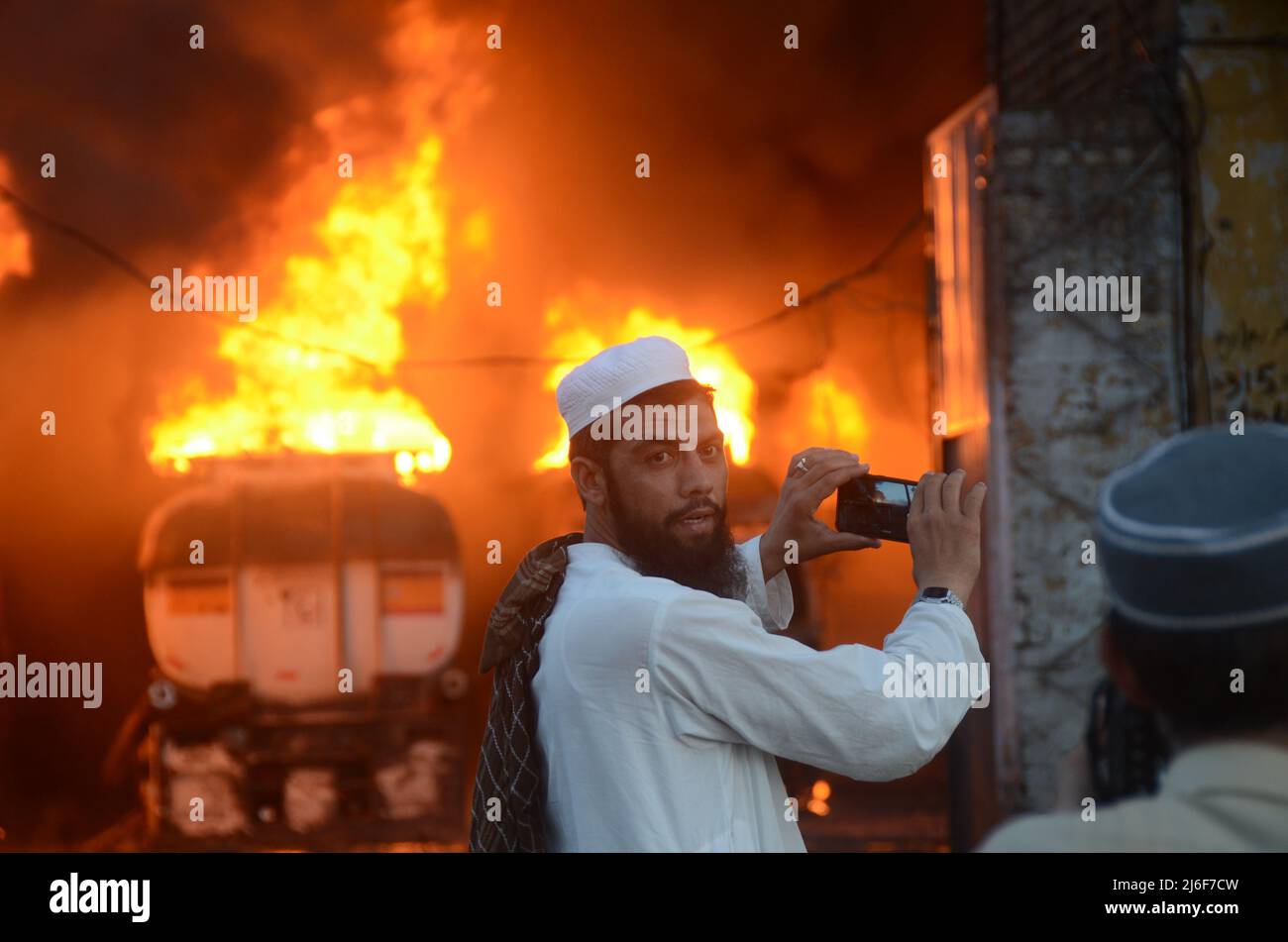 Firefighters try to extinguish the fire broke out at an oil tanker ...