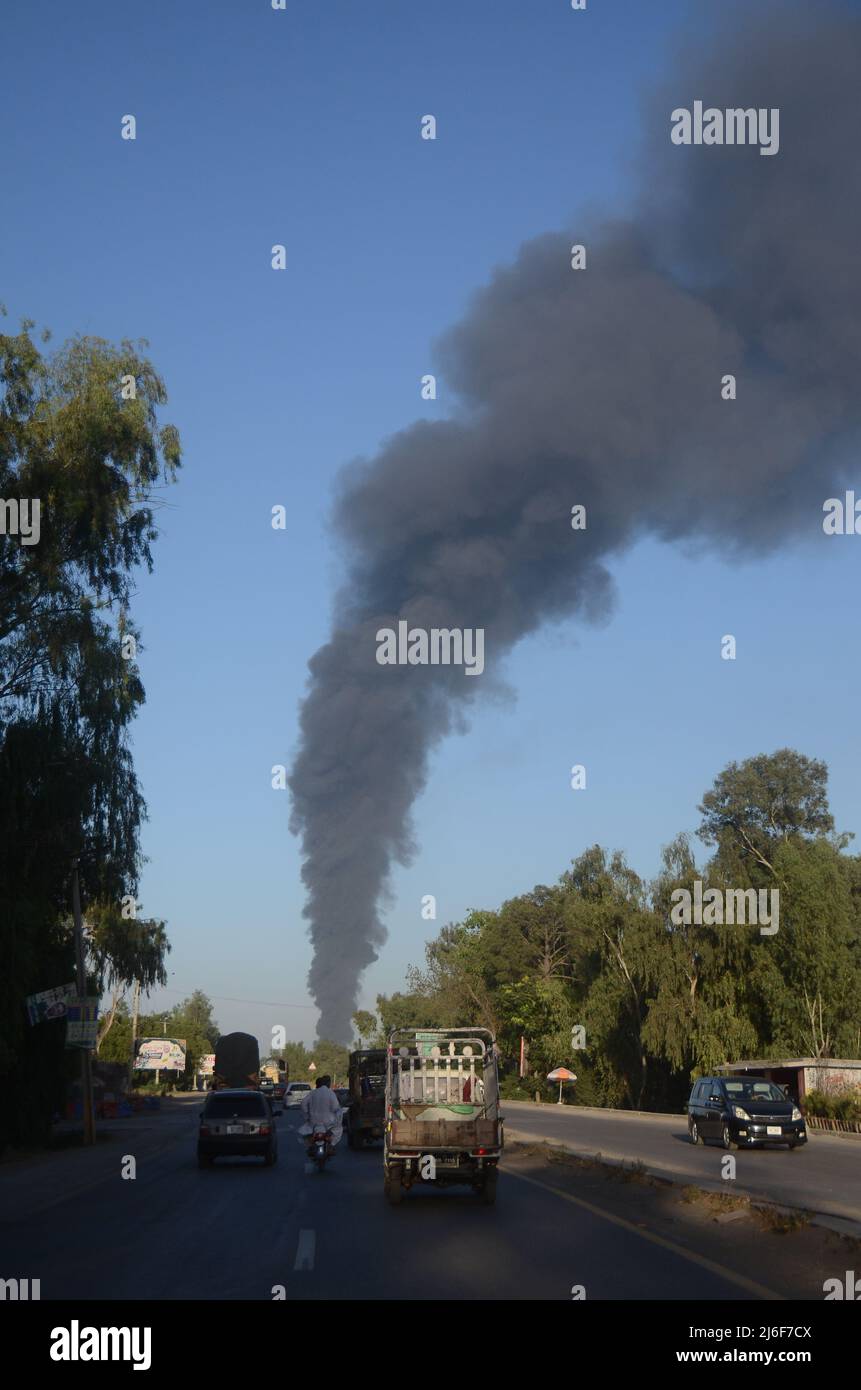 Firefighters try to extinguish the fire broke out at an oil tanker ...