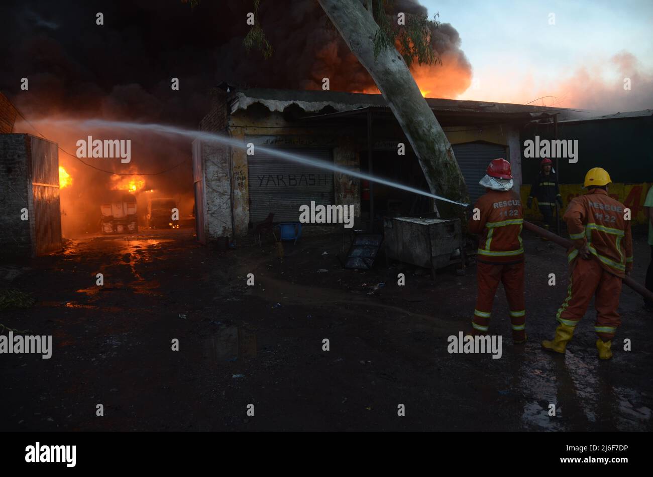Firefighters try to extinguish the fire broke out at an oil tanker ...