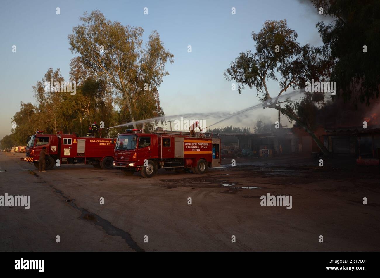 Firefighters try to extinguish the fire broke out at an oil tanker ...