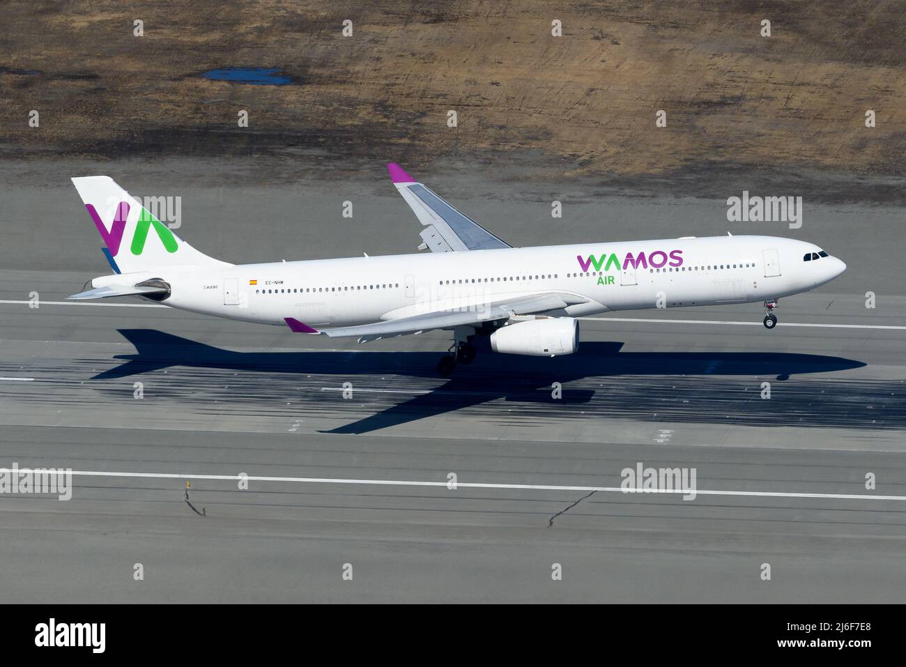 Wamos Air Airbus A330-300 plane landing. Aircraft A330 of charter airline WamosAir. Airplane registered as EC-NHM. Stock Photo