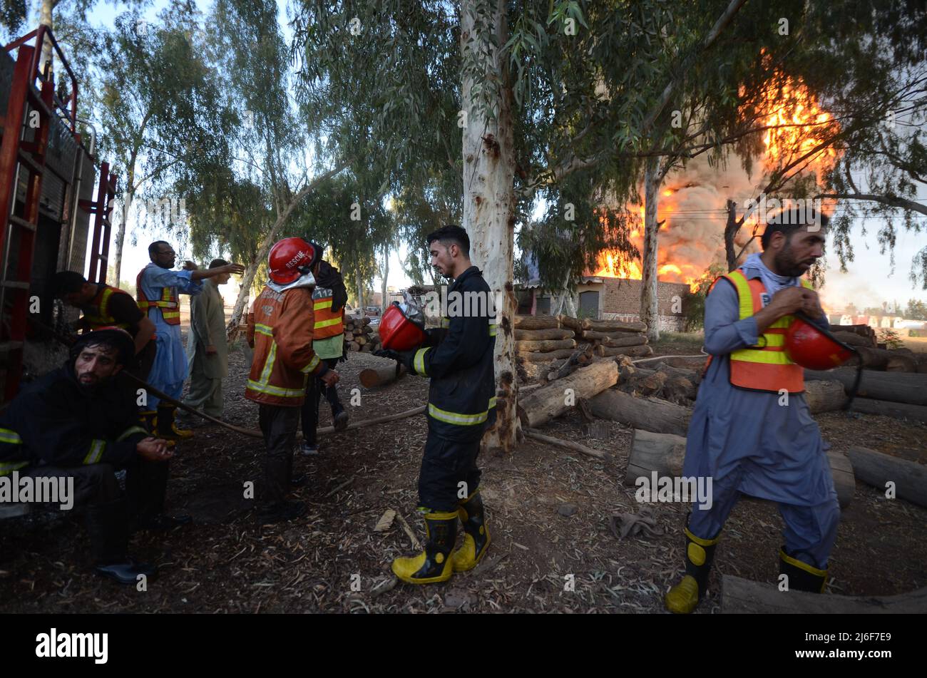 Firefighters try to extinguish the fire broke out at an oil tanker ...