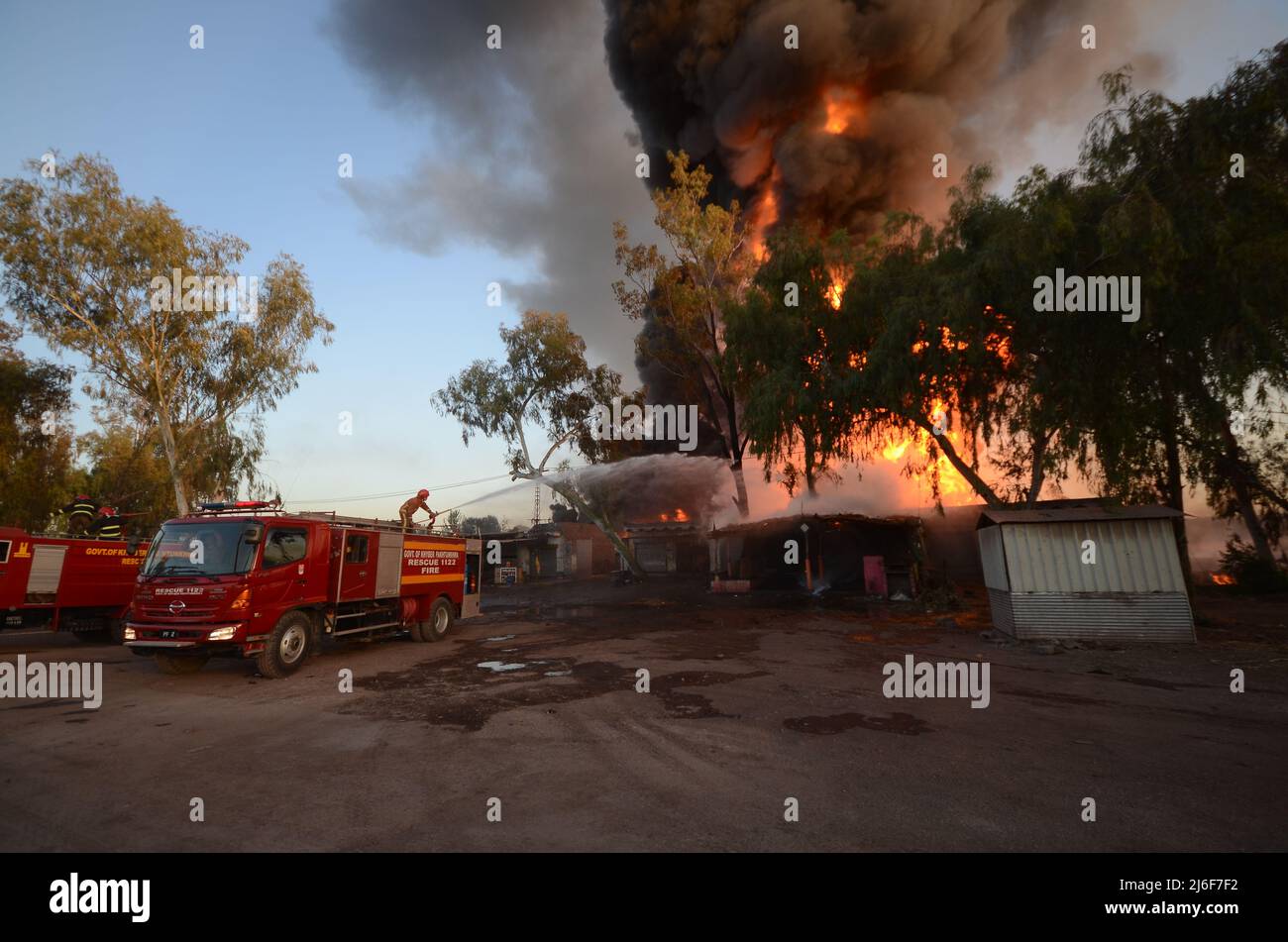 Firefighters try to extinguish the fire broke out at an oil tanker ...