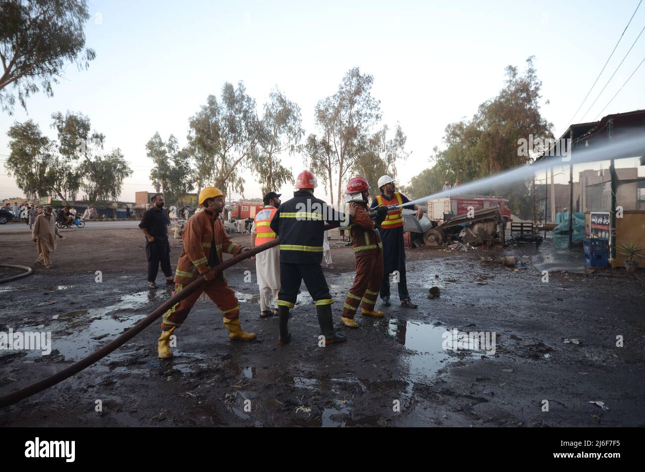 Firefighters try to extinguish the fire broke out at an oil tanker ...