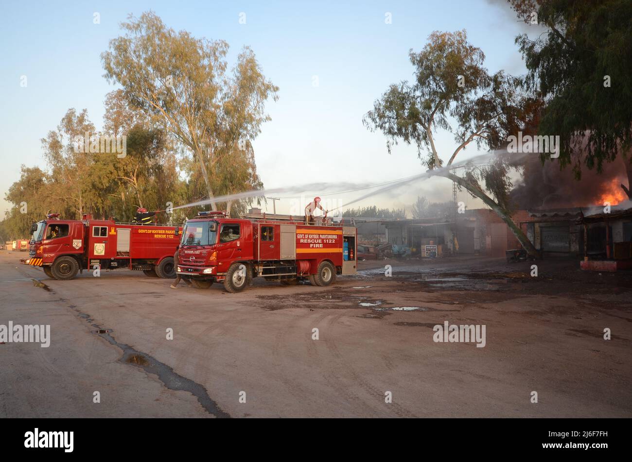 Firefighters try to extinguish the fire broke out at an oil tanker ...