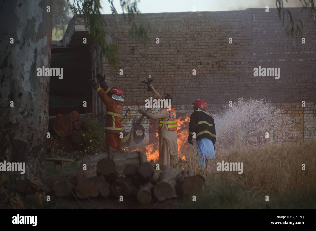 Firefighters try to extinguish the fire broke out at an oil tanker ...