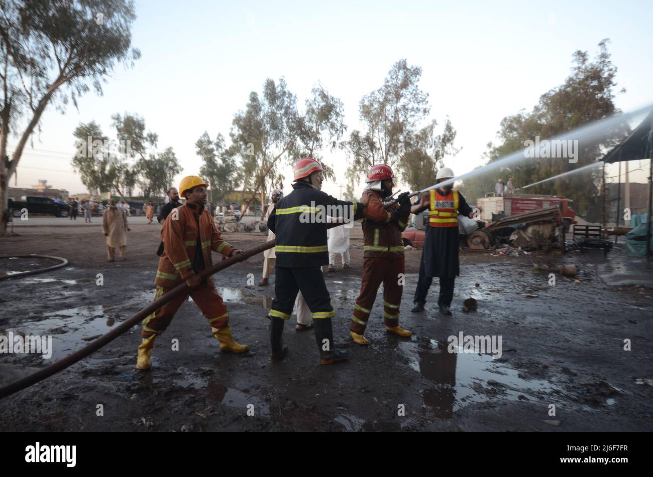 Firefighters try to extinguish the fire broke out at an oil tanker ...