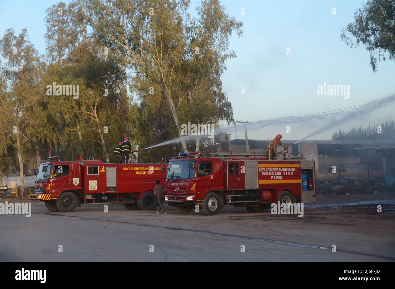 Firefighters try to extinguish the fire broke out at an oil tanker ...