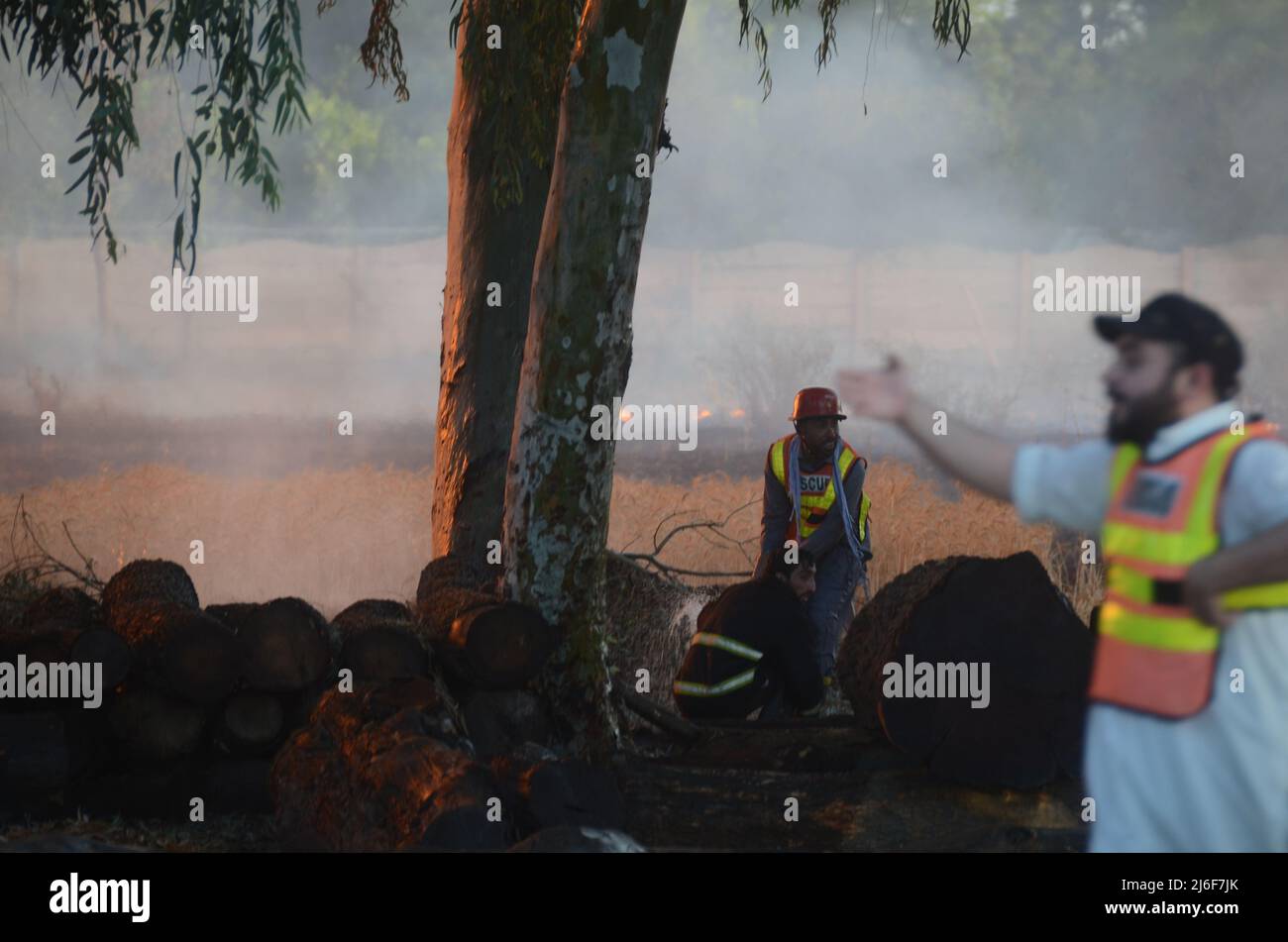 Firefighters try to extinguish the fire broke out at an oil tanker ...