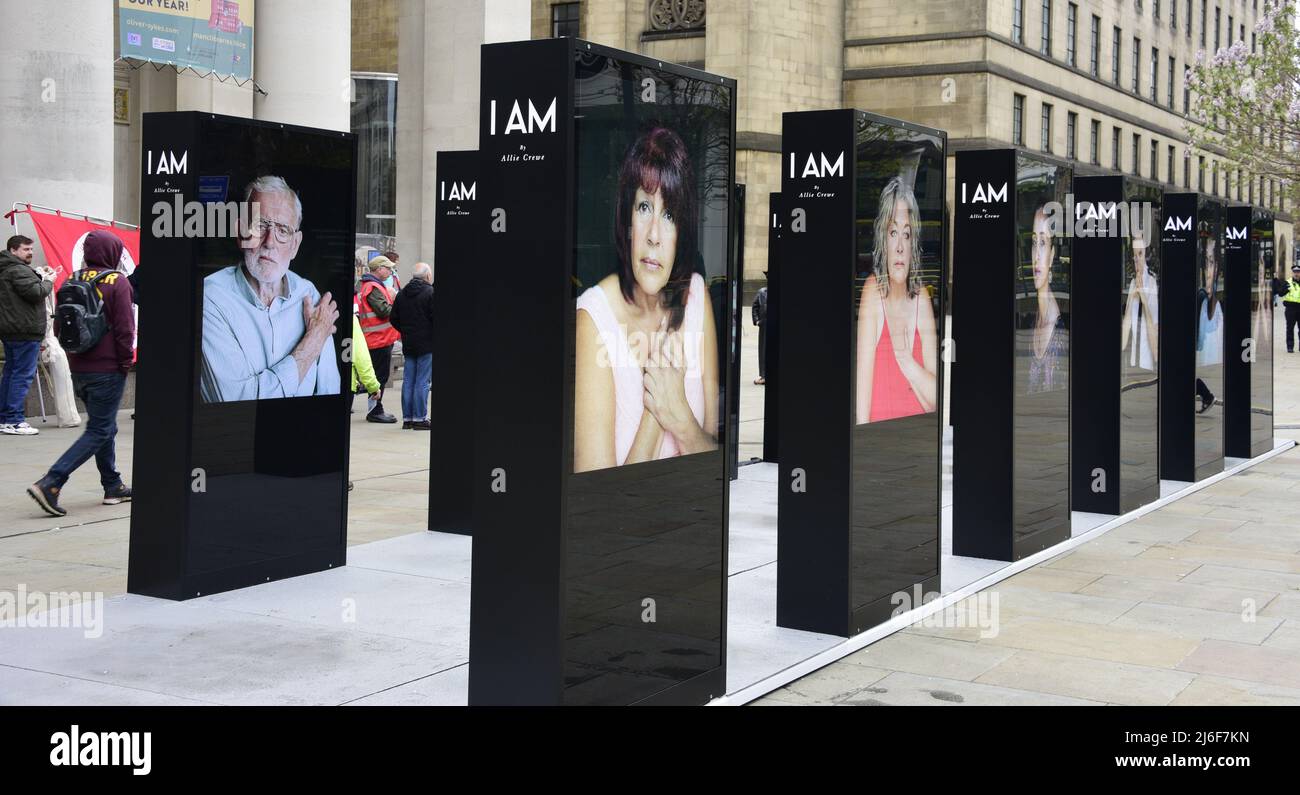 Manchester, UK, 1st May, 2022. The SICK! Festival has a new exhibition of portraits of survivors of domestic abuse, titled I AM, by photographer Allie Crewe in St Peter's Square, central Manchester, UK. The exhibition runs from 1st – 31st May, 2022. Allie Crewe has been an artist in residence with the charity SafeLives, a UK charity dedicated to ending domestic abuse, during the development of I AM.  Credit: Terry Waller/Alamy Live News Stock Photo