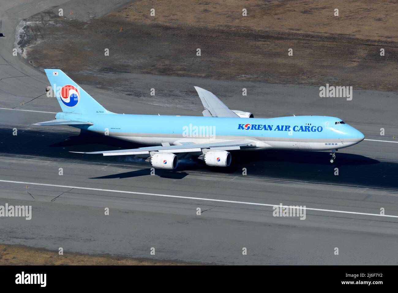 Korean Air Cargo Boeing 747 plane landing. Airplane 747-8F flying cargo. Freighter aircraft of KoreanAir Cargo arrival. Stock Photo