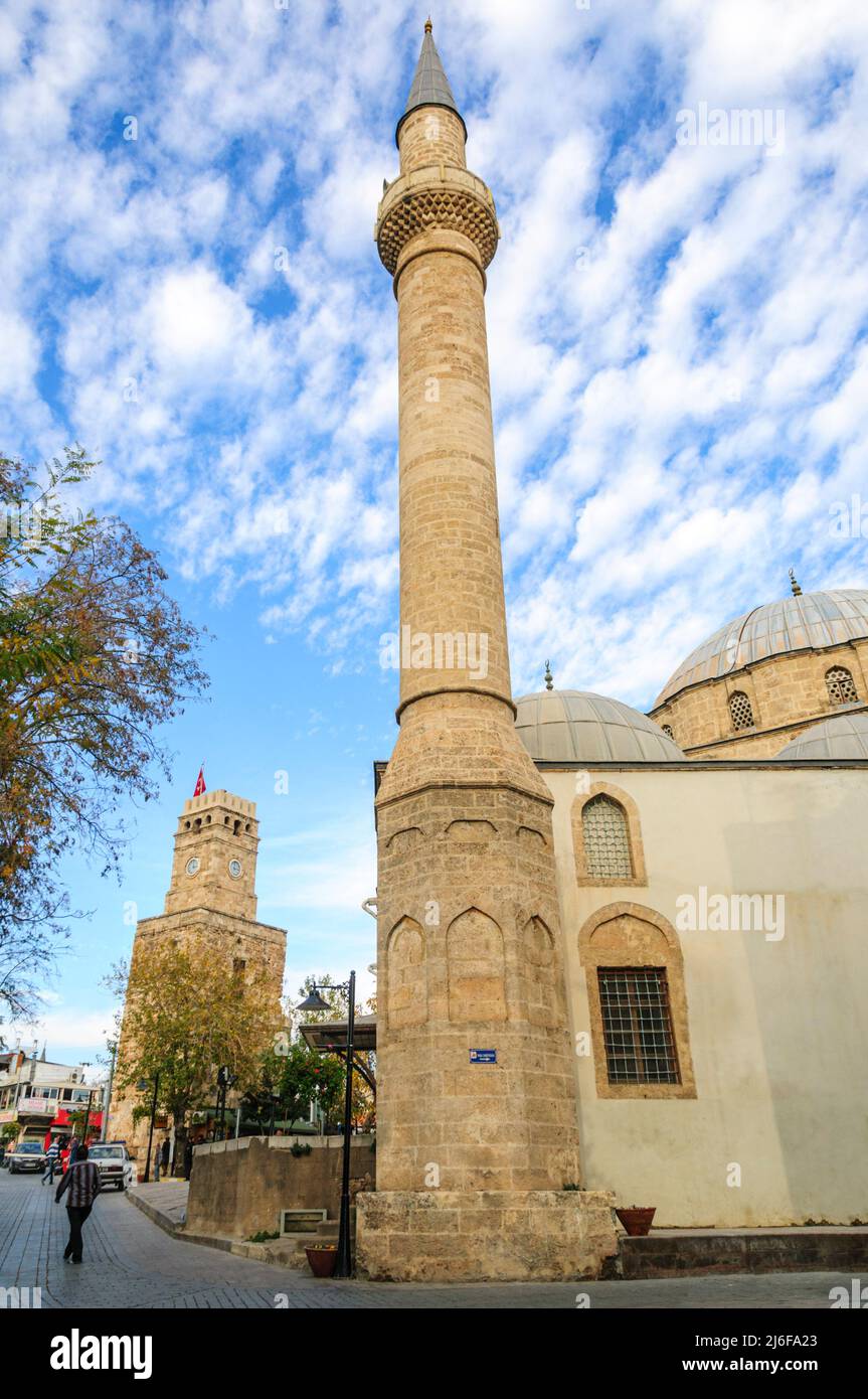 Saat Kulesi, the clock tower, and the Tekeli Mehmet Pasha Mosque, in Kaleici, the historic old town of Antalya Stock Photo