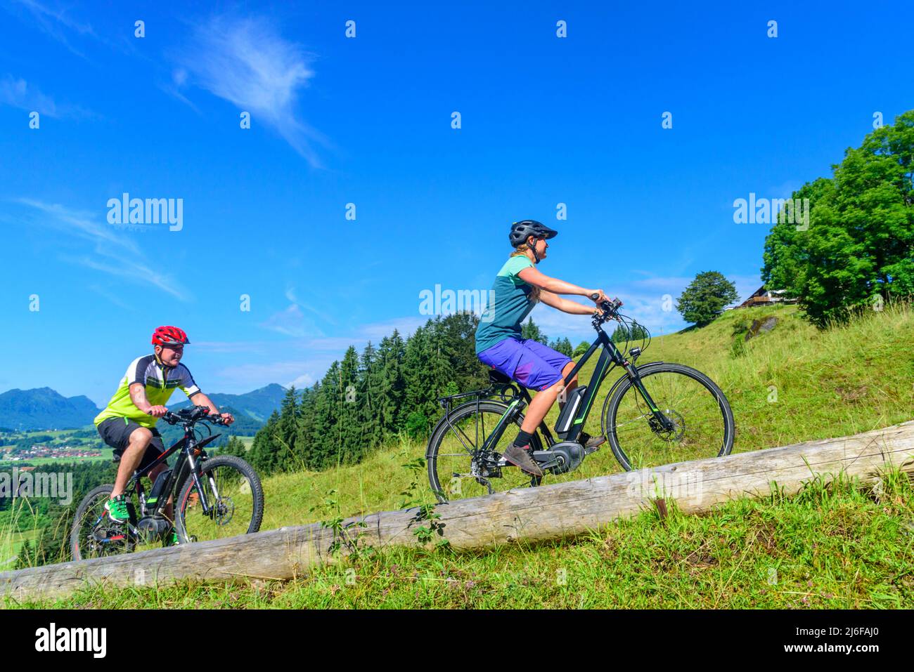 Mountainbikers with pedelecs at Senkele near Seeg in Ostallgäu Stock Photo