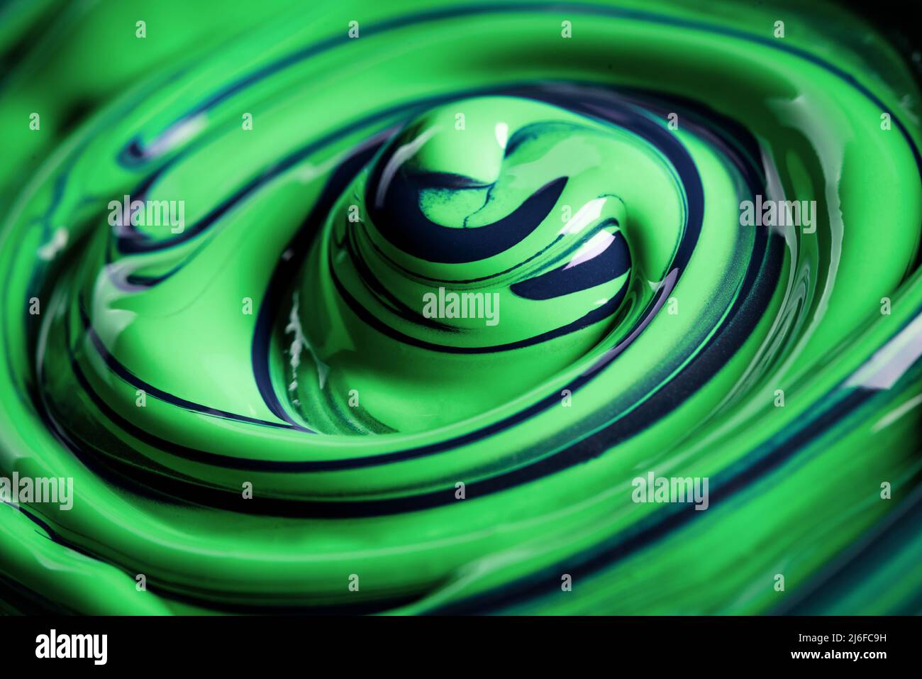 Mixed thick glossy paint close up, art and bright vivid color concept