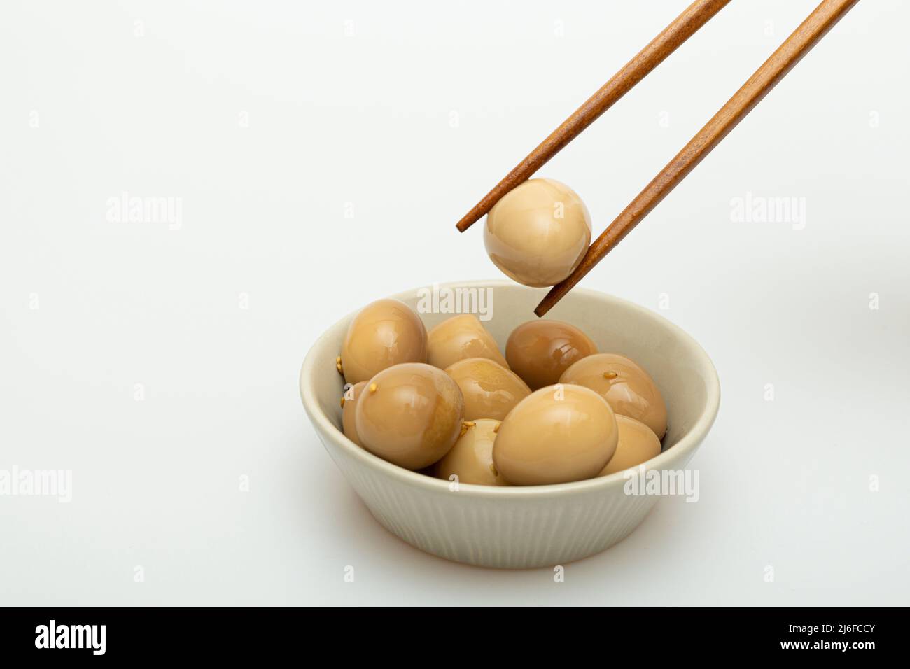 Braised Quail Eggs in Soy Sauce in a Bowl Stock Photo Alamy