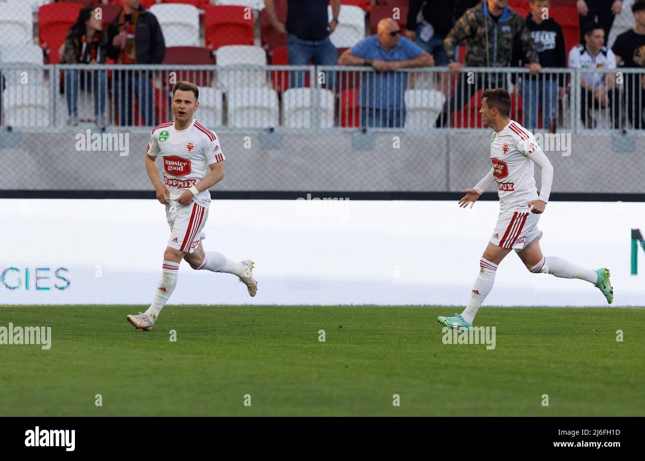 Claudiu Bumba of Kisvarda Master Good passes the ball in front of