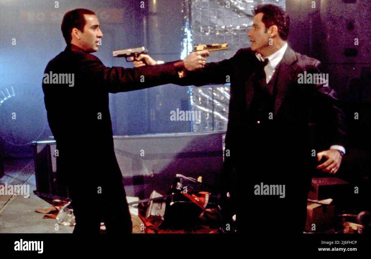 FACE /OFF 1997 Paramount Pictures film with Nicholas Cage at left and John Travolta Stock Photo