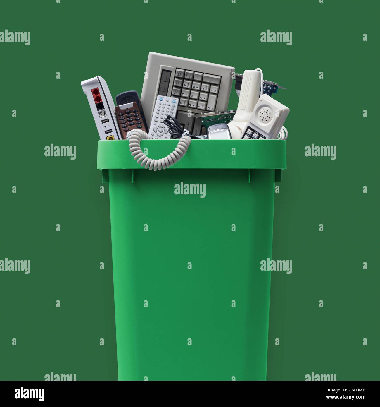 Waste bin full of electronics, ewaste and recycling concept Stock Photo Alamy