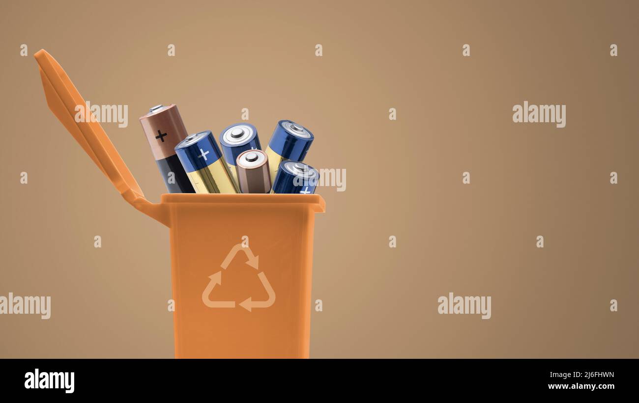 Trash bin full of batteries, recycling and hazardous waste disposal