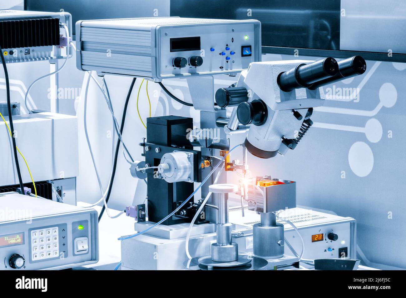 Chip testing equipment. Manufacturing of microchips. A closeup study of a test sample of a