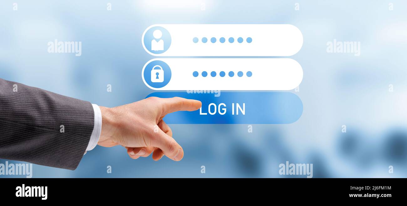 Corporate businessman logging into a website online using his username and password Stock Photo