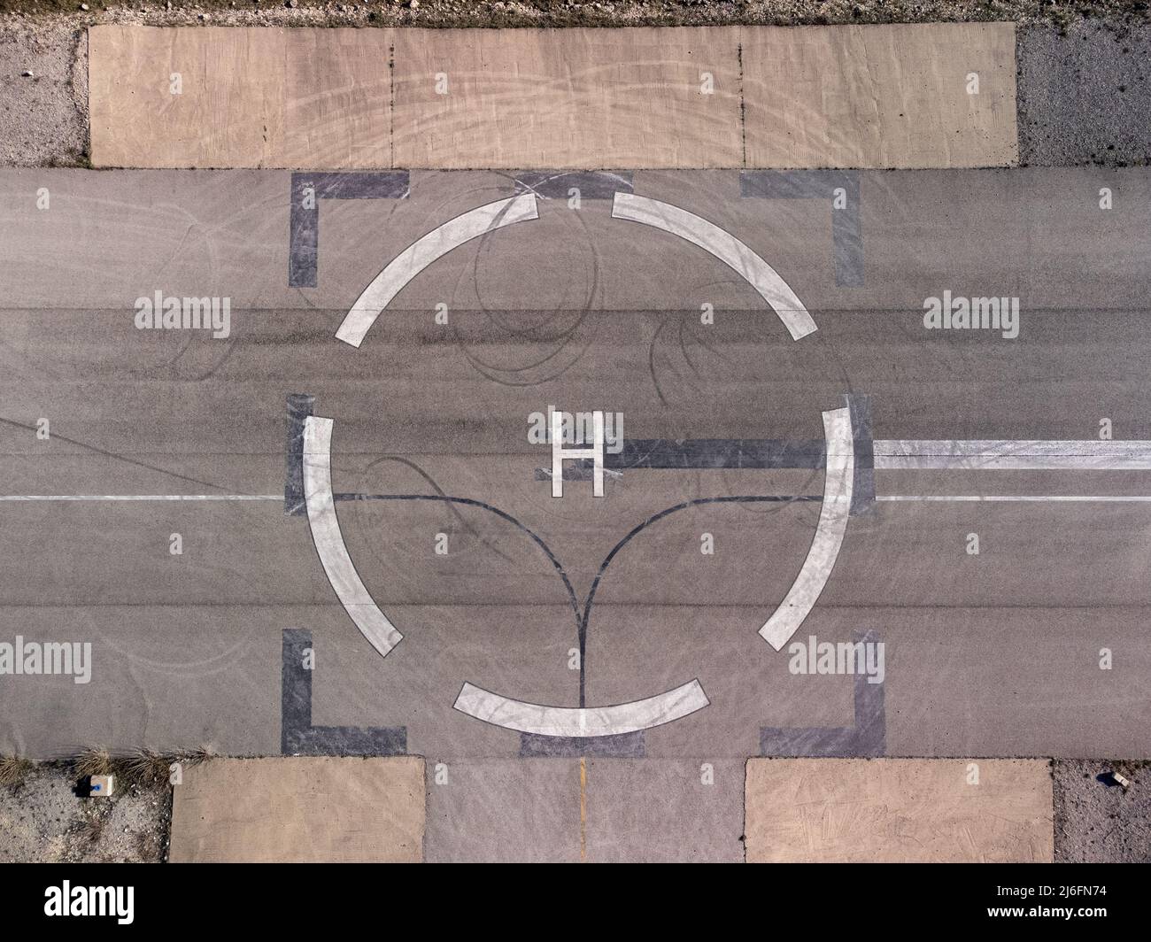 Helicopter landing symbol on a helipad Stock Photo Alamy