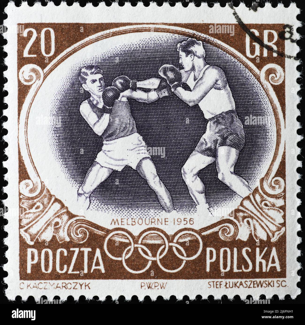 Boxers in action on vintage polish postage stam Stock Photo