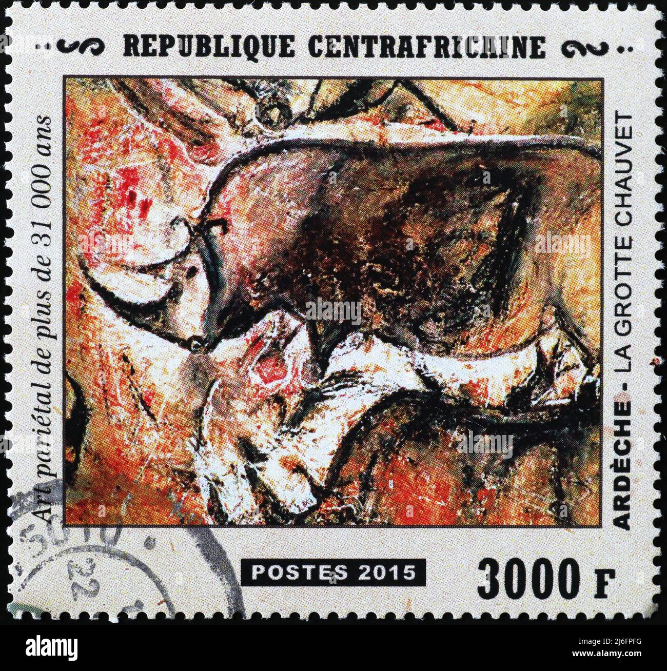 Prehistoric depictions of a rhino from Chauvet caves on stamp Stock Photo