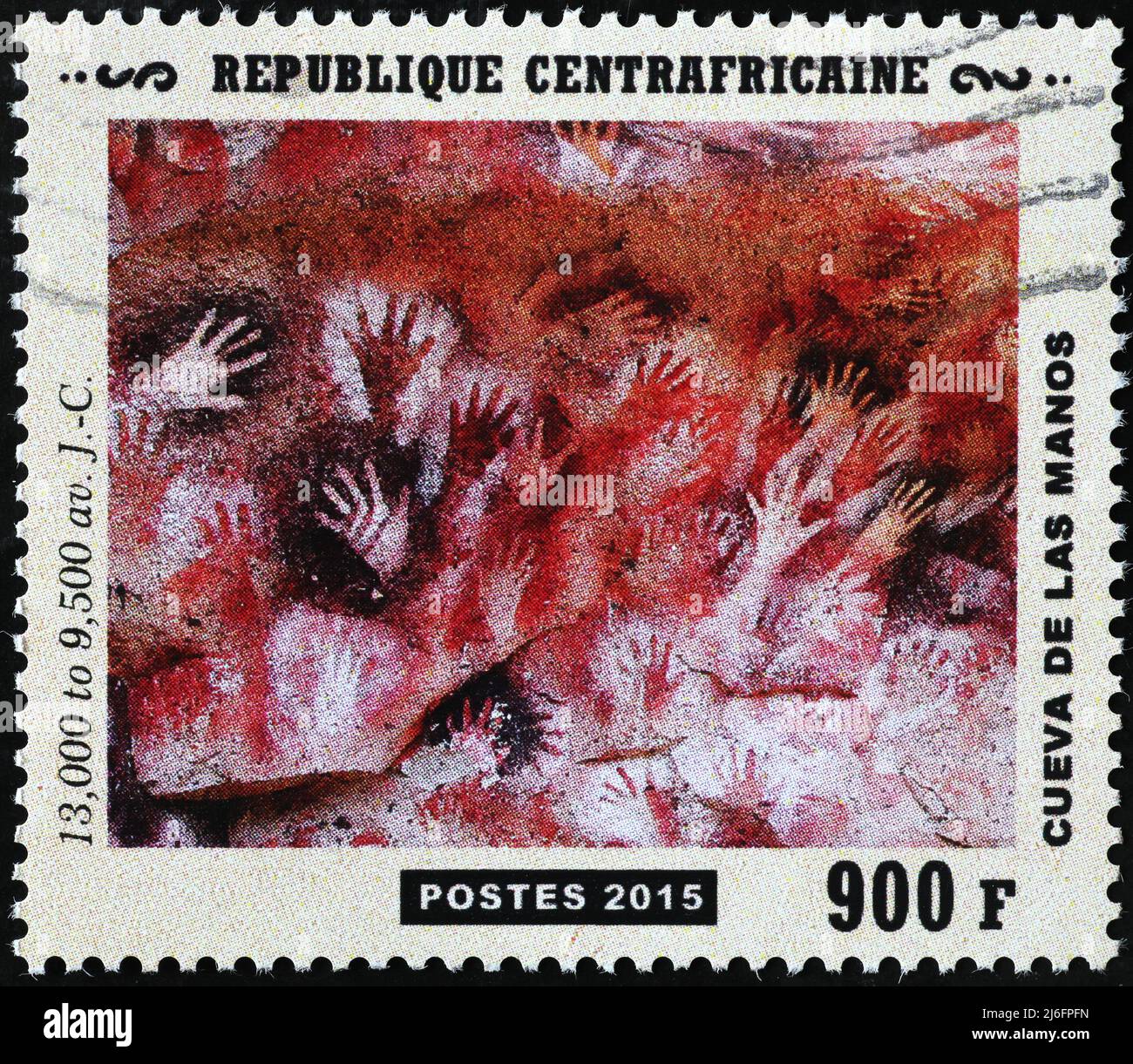 Prehistoric depictions of hands from Argentina on postage stamp Stock Photo