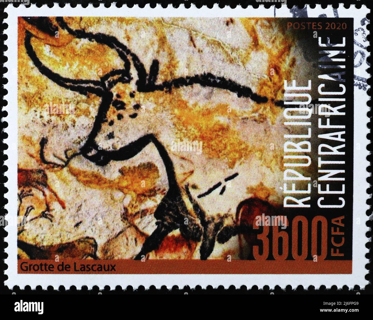 Prehistoric depictions of ox from Lascaux caves on stamp Stock Photo