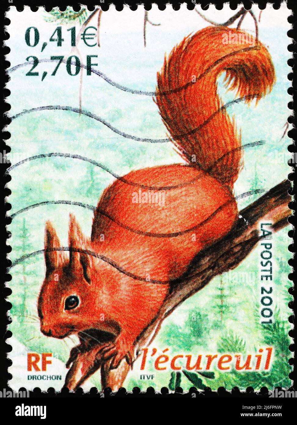 Red squirrel on french postage stamp Stock Photo