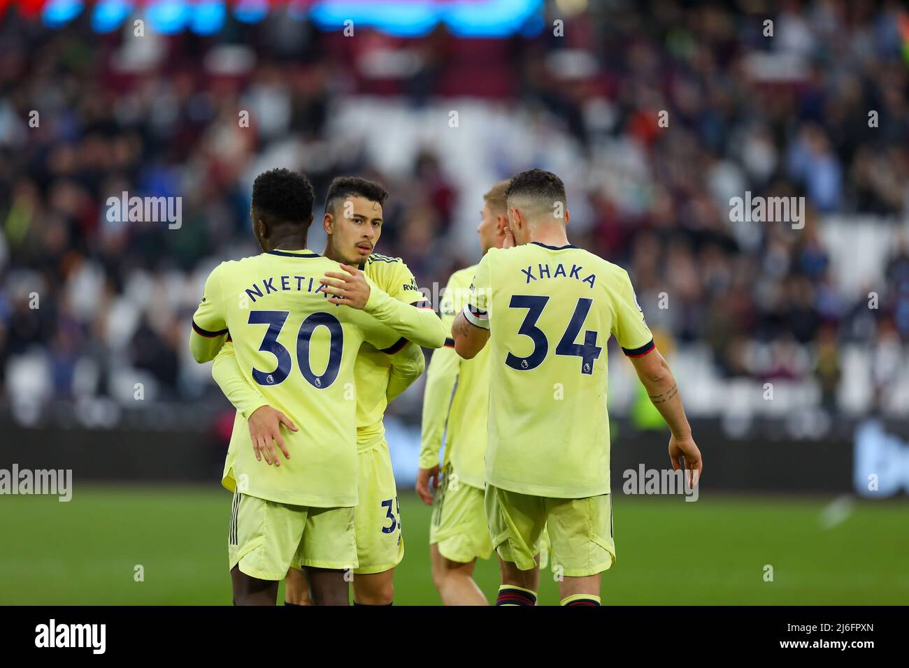London, UK. May 1st 2022: London Stadium, London, England; Premier League football West Ham versus Arsenal; Arsenal's Gabriel Martinelli embraces Eddie Nketiah post match. Credit: Action Plus Sports Images/Alamy Live News Stock Photo