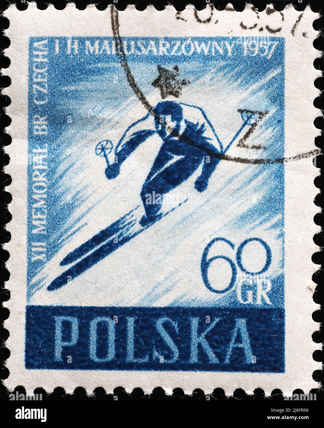 Skier on vintage polish postage stamp Stock Photo