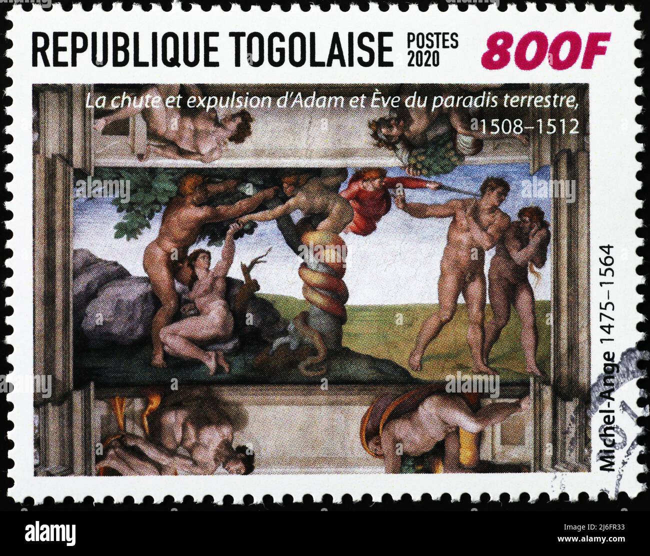 The expulsion from Eden by Michelangelo on postage stamp Stock Photo