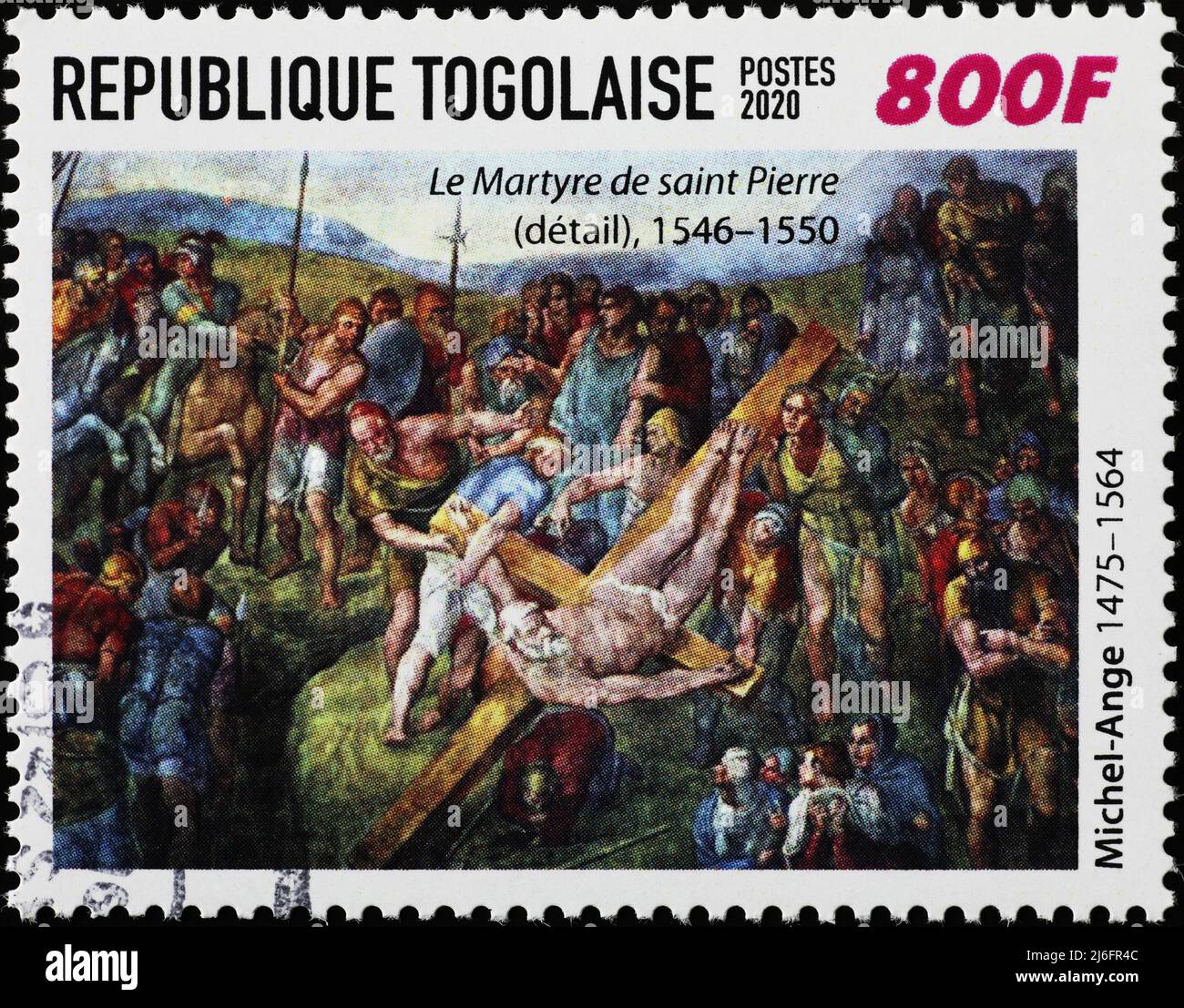 The martyrdom of saint Peter by Michelangelo on postage stamp Stock Photo