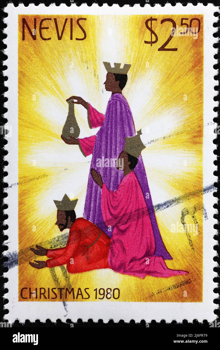 Three kings on Christmas stamp from Nevis Stock Photo