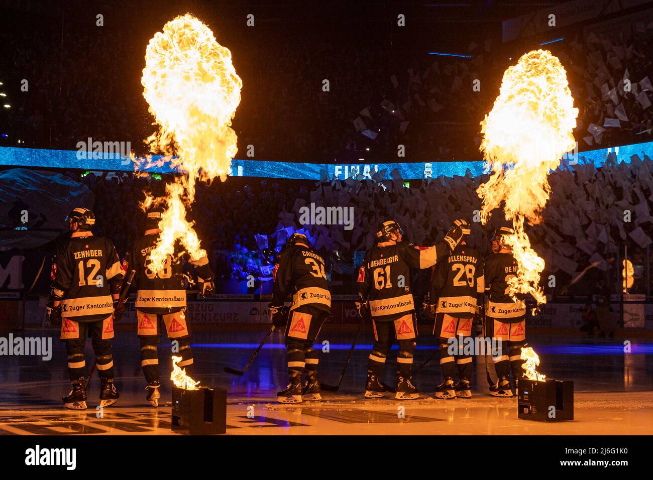 Zug players in front of the fire pillar during the National League