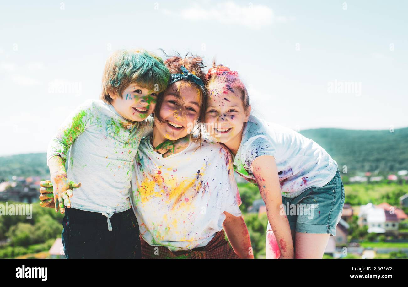 Kids painted in the colors of Holi festival. Stock Photo