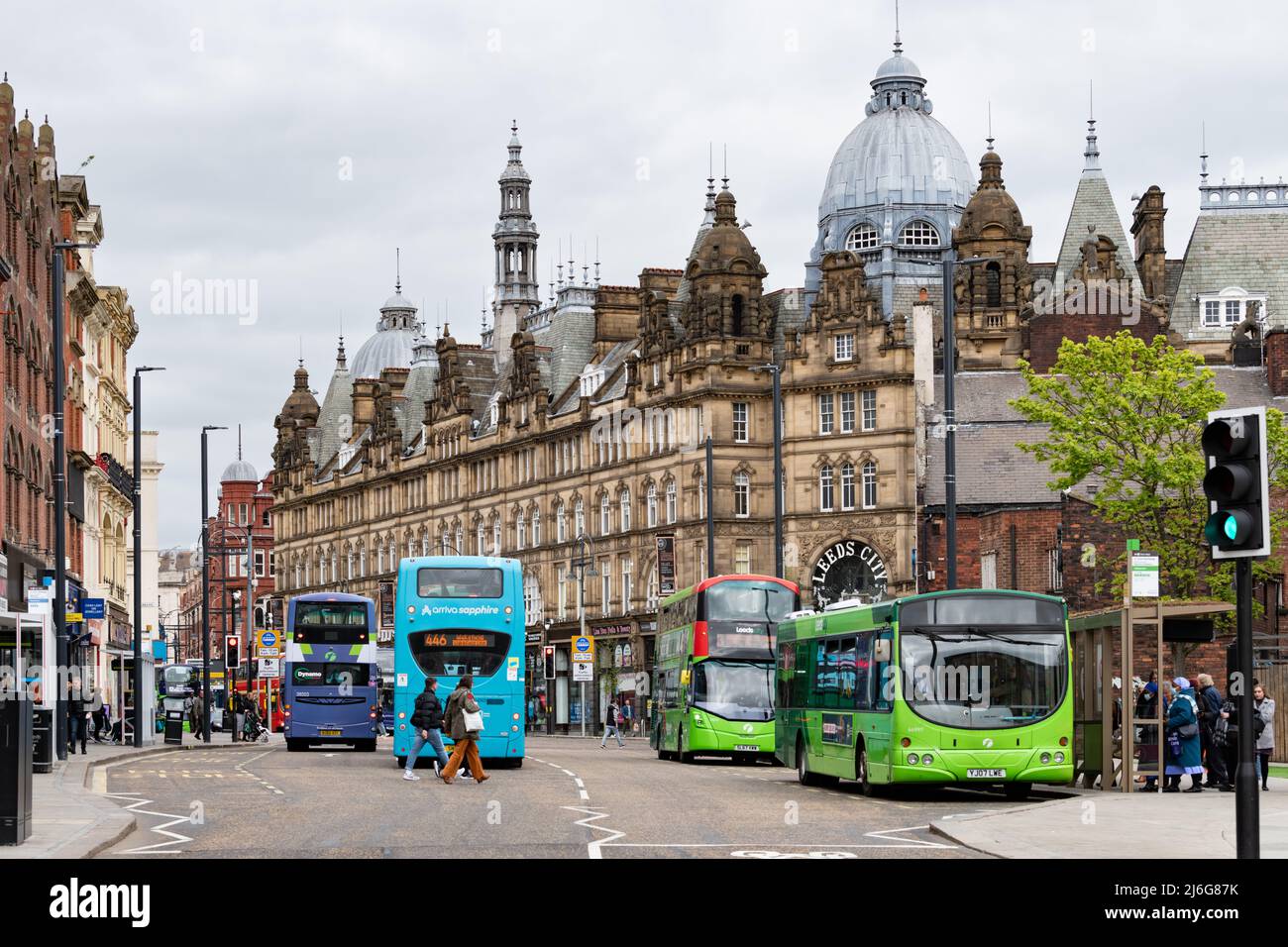 Leeds - Kirkgate Market, Vicar Lane and buses at Corn Exchange bus stops Stock Photo