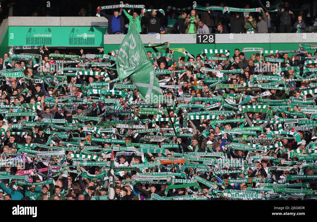 firo: April 29th, 2022, Fuvuball, soccer, 2nd Bundesliga, season 2021/2022, Werder Bremen - Holstein Kiel 2:3 Werder FAns, scarves, fan block, Weser Stadium, backing, background Stock Photo