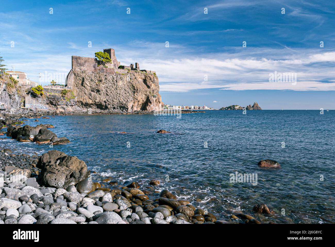 The norman castle of Acicastello, near Catania, built on a lava cliff on the sea. Sicily, Italy. Stock Photo