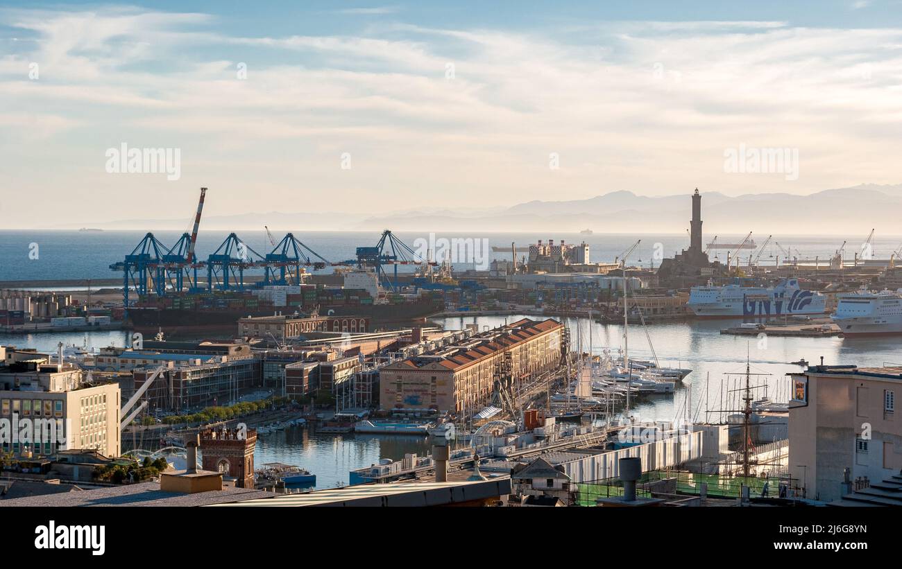 Panoramic view of the harbor of Genoa with Lanterna lighthouse in the background. Liguria, Italy Stock Photo