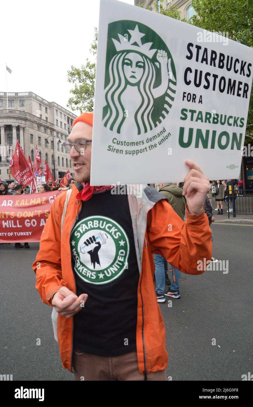 The well known starbucks coffee house chain baner Stock Photo Alamy