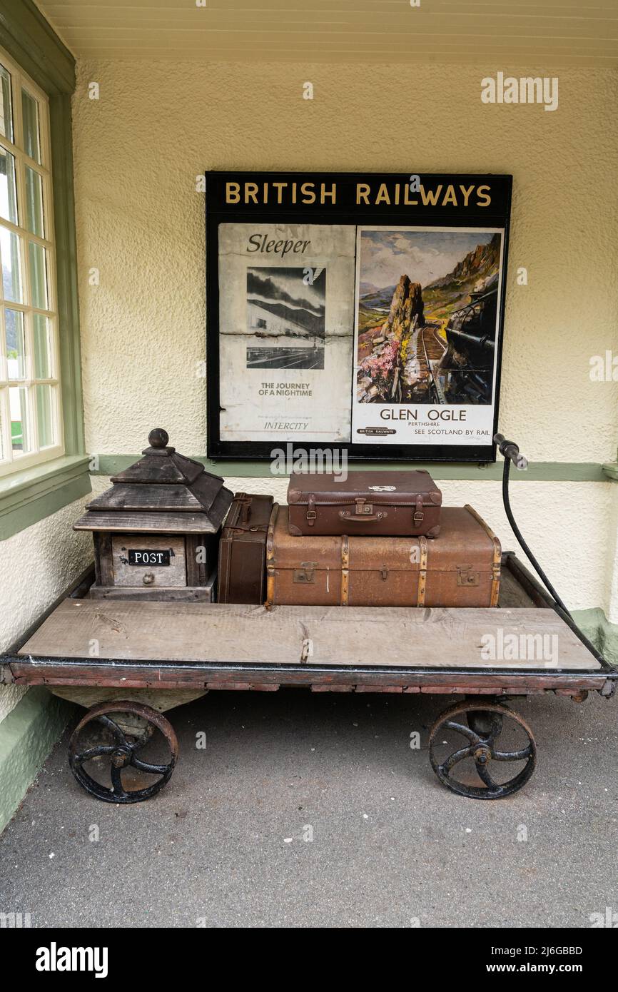 Trolley cart with antique luggage, Glenfinnan railway station, Glenfinnan, Scotland, UK Stock Photo