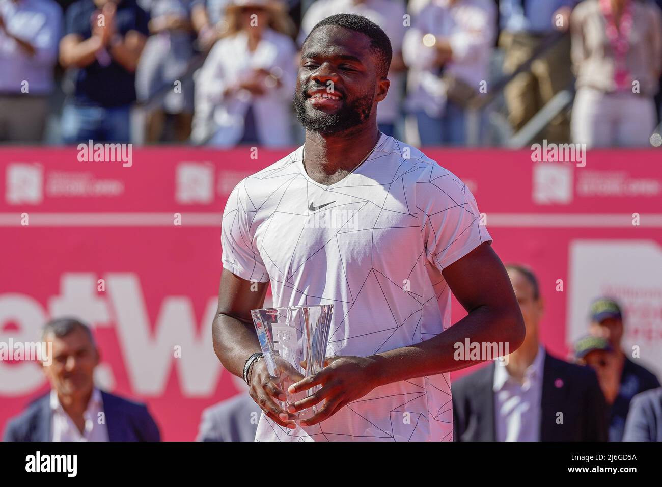 Frances Tiafoe from United States of America holds a trophy after Millennium Estoril Open Final ATP 250 tennis tournament at the Clube de Tenis do Estoril.Final score Frances Tiafoe 02 Sebastian Baez