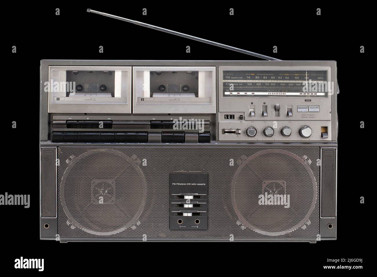 Vintage portable stereo boombox radio cassette recorder from 80s on black background. Stock Photo