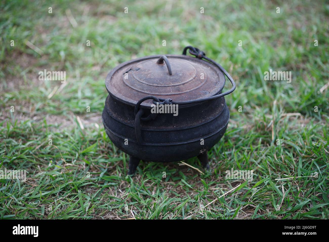 Cooking on fire, pot with food, cooking on a hike. Stock Photo