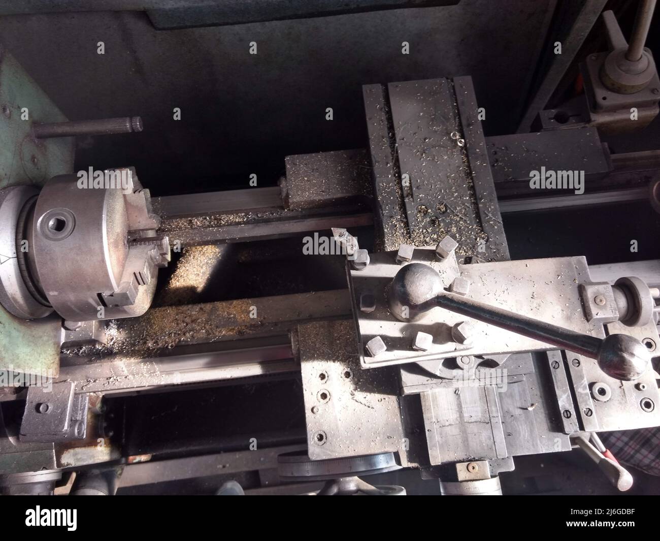 Part of lathe in old plant. Old vintage turning lathe for metal processing Stock Photo Alamy