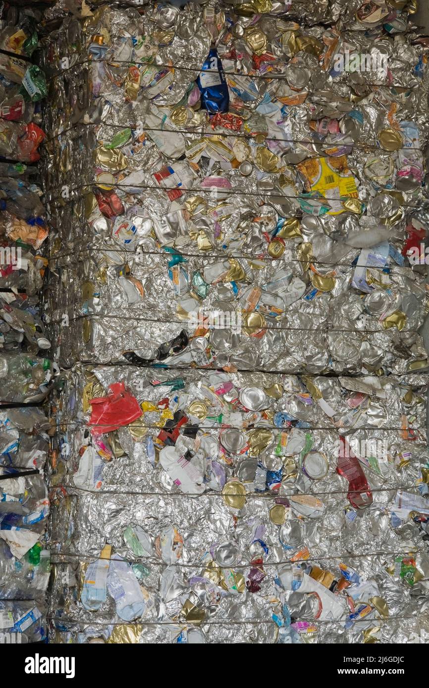 Bales of recyclable aluminum cans and containers at sorting centre